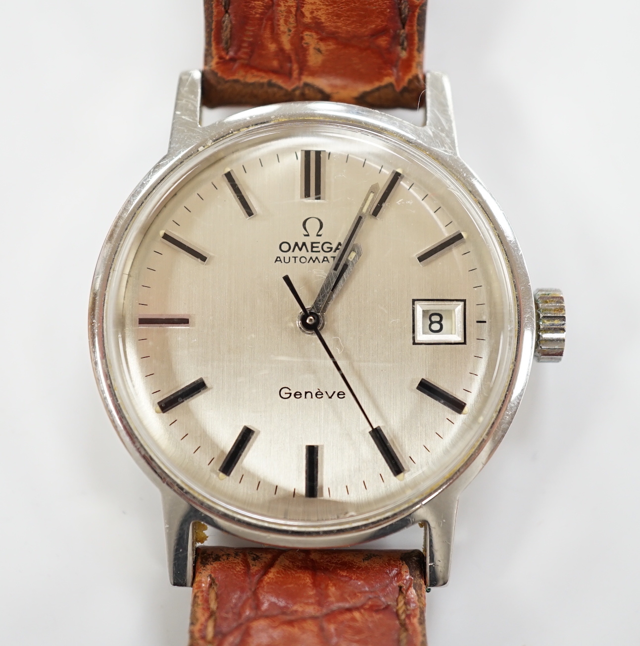 A gentleman's stainless steel Omega automatic wrist watch, with date aperture, on associated leather strap with detached buckle, case diameter 36mm, box but no papers.